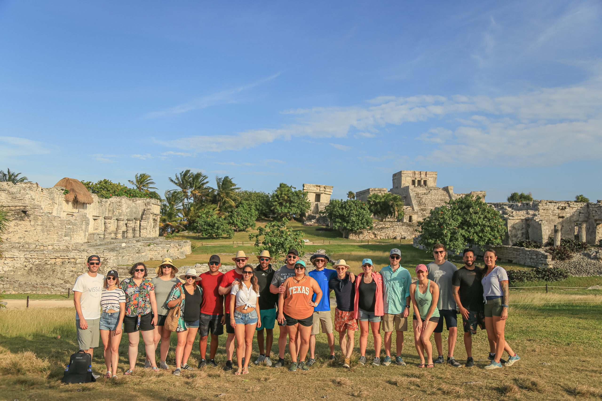 photo of group of guests visiting Tulum Ruins