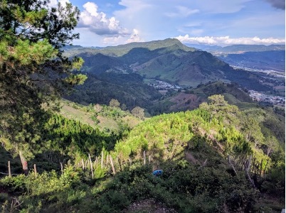 An image of grassy mountains in the Dominican Republic.